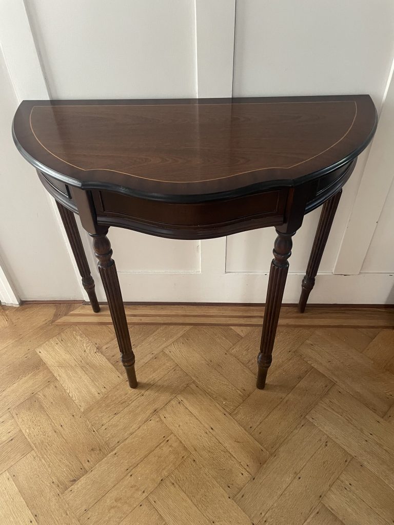 The vintage console table before restoration, in its original finish